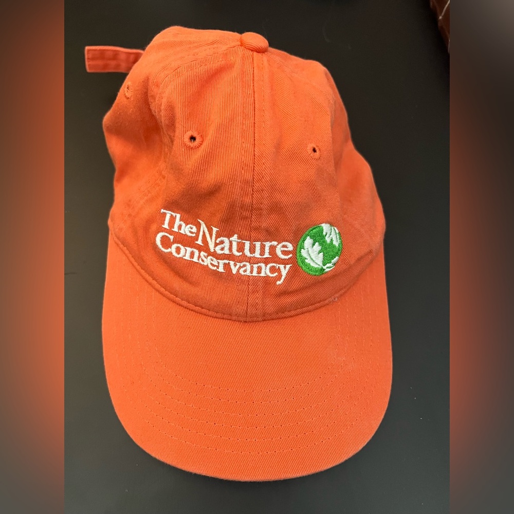 The Nature Conservancy orange baseball cap
